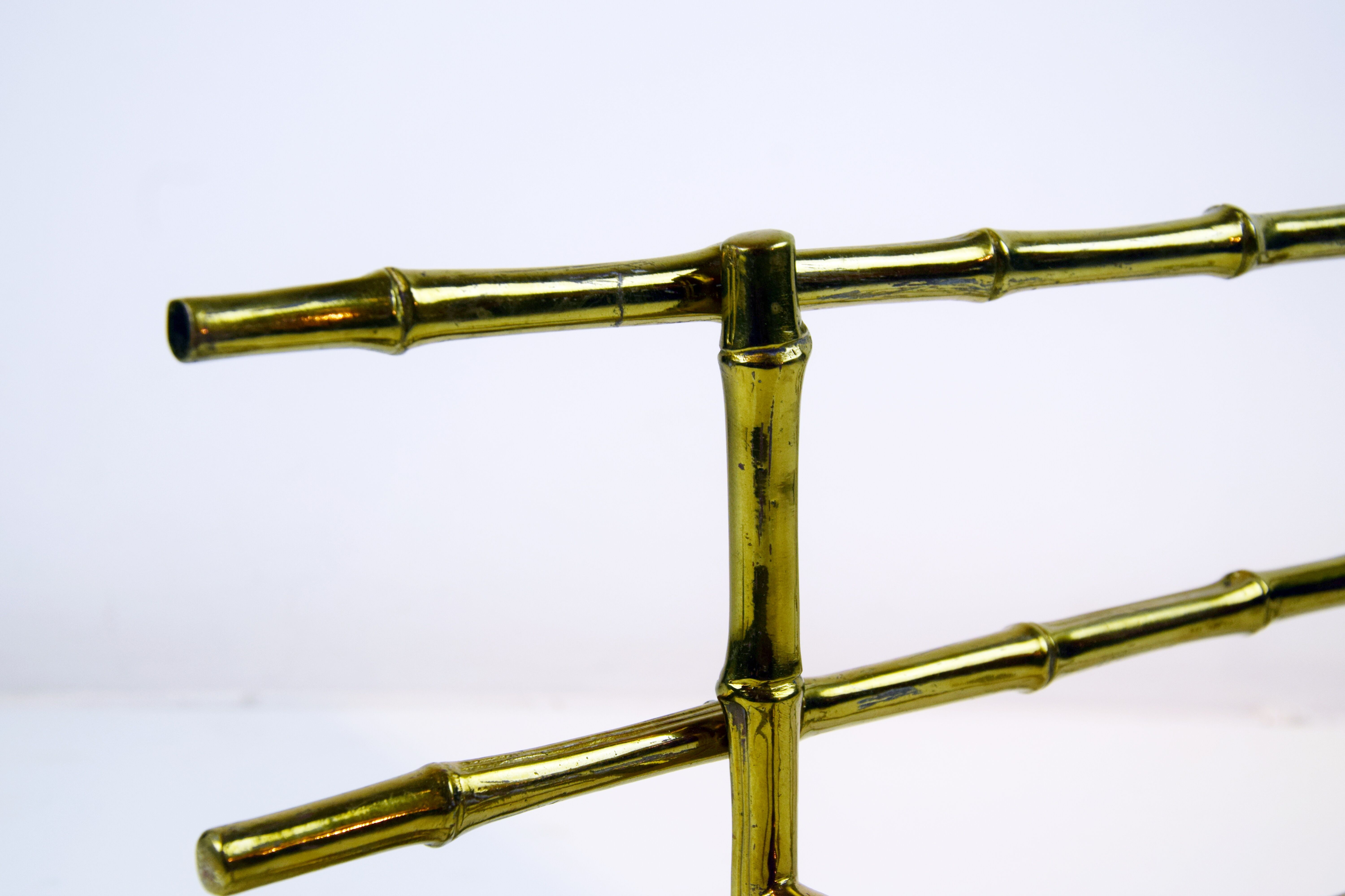 Bamboo-like coat rack in bronze