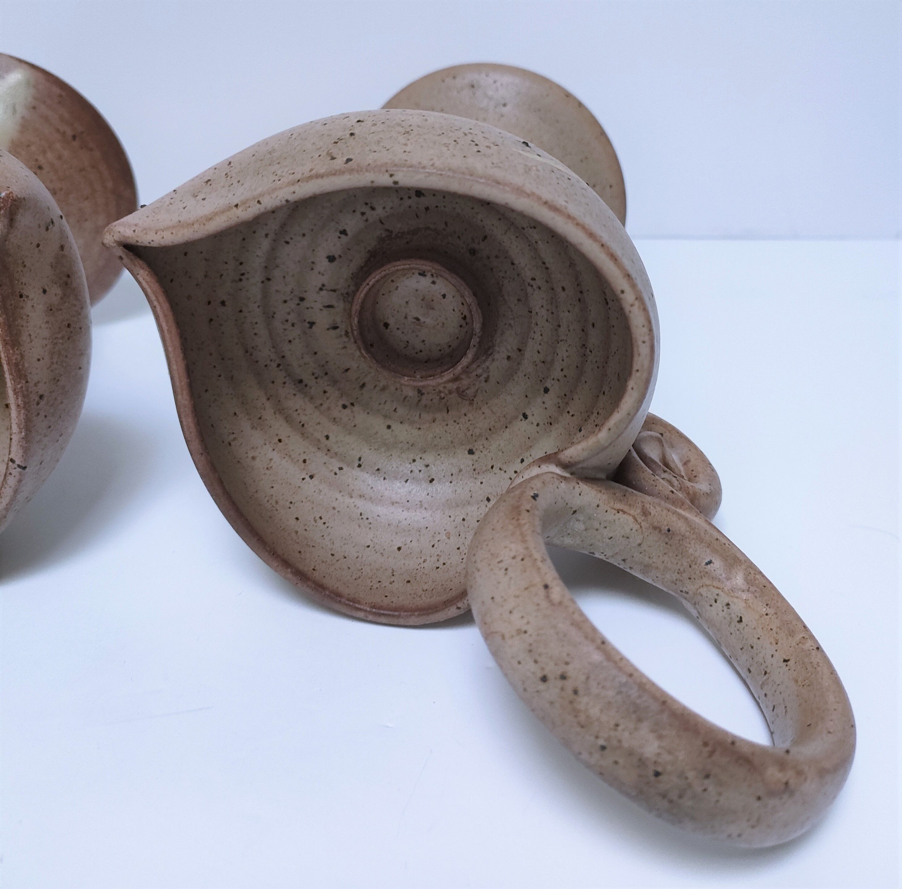 Pair of vintage “heart” sandstone candlesticks