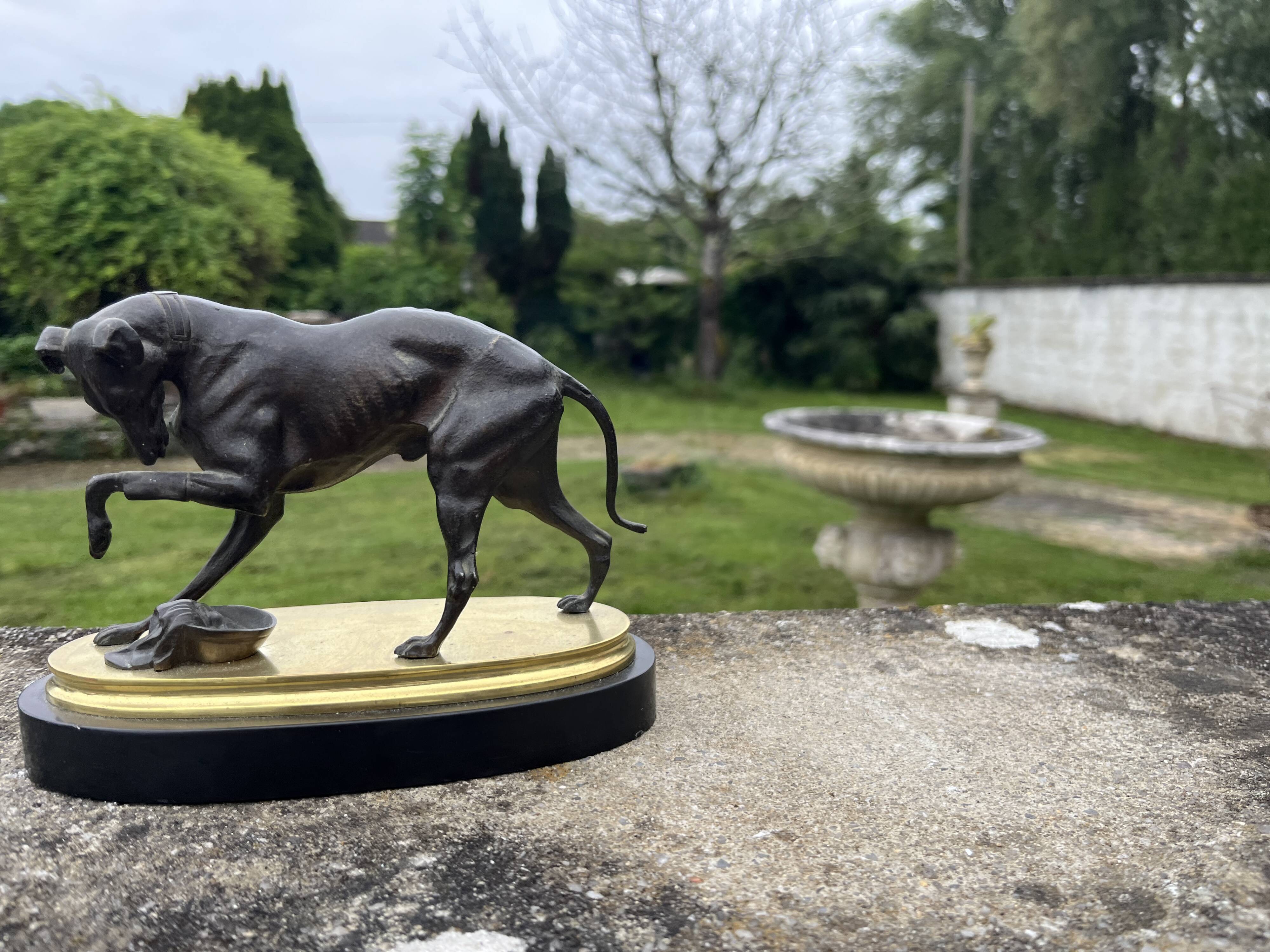 Bronze hunting dog and its prey – black marble base brass – s