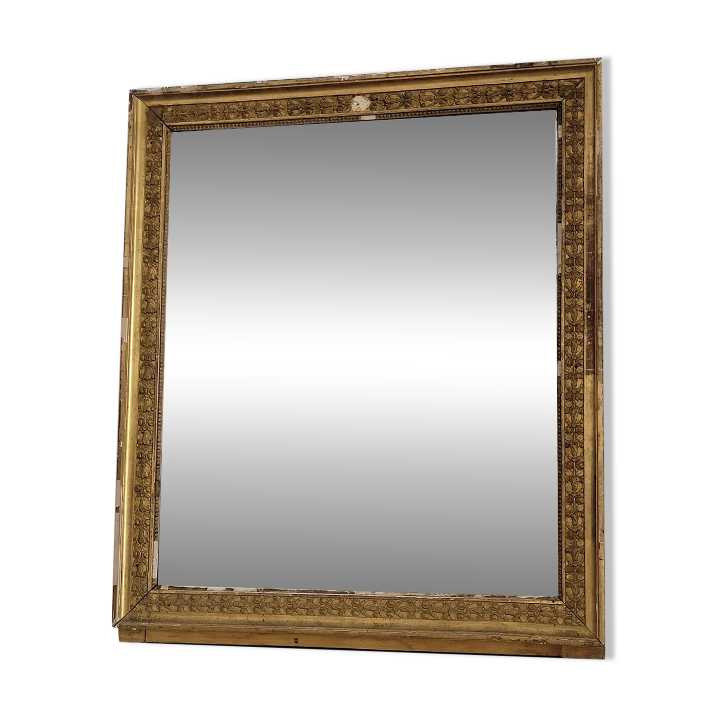 Golden stucco and wood Empire mirror
