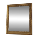 Golden stucco and wood Empire mirror