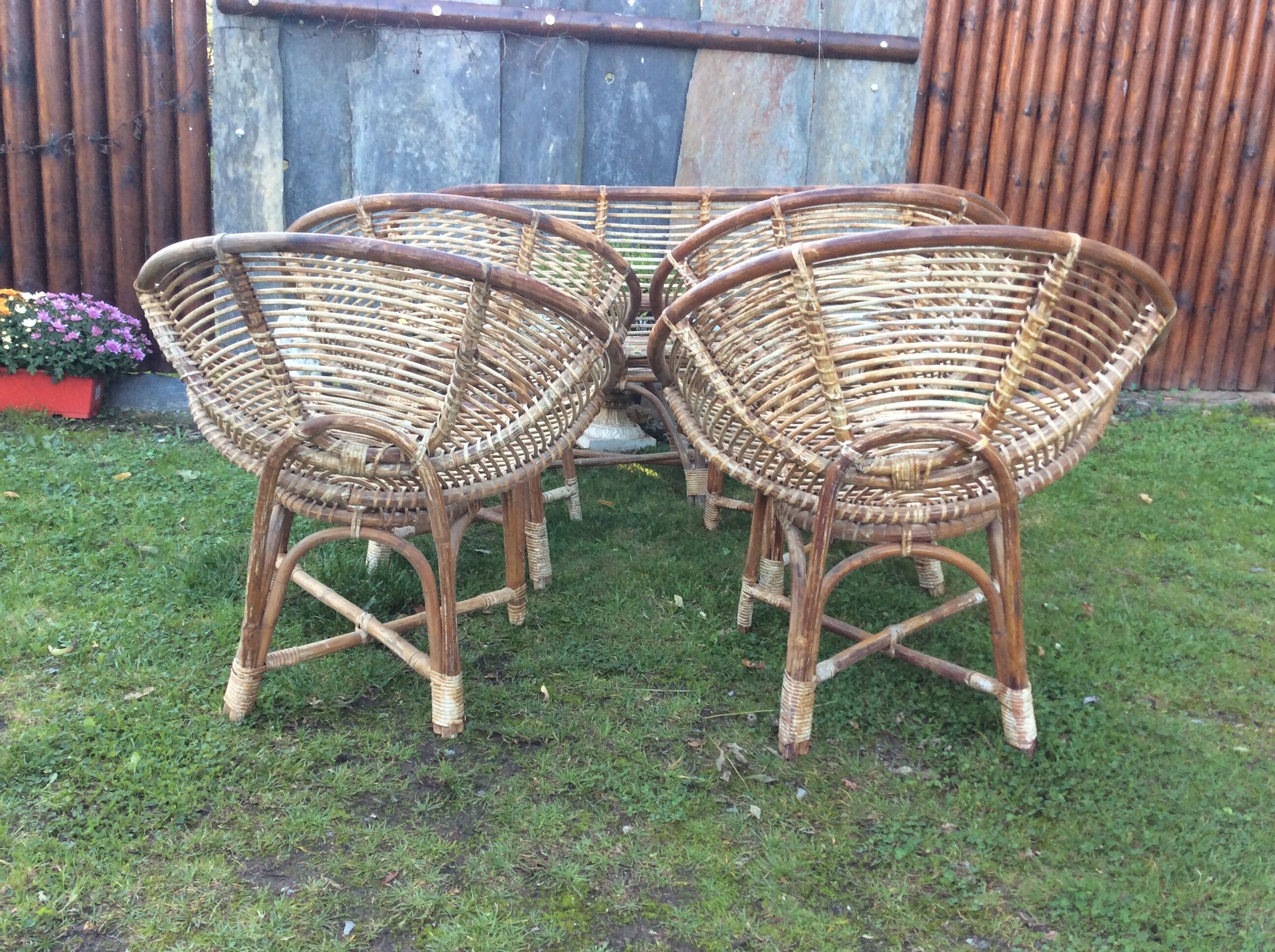 Set of 4 armchairs and 1 vintage rattan bench (5 pieces) inseparable.