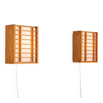 Pair of pinewood wall lamps produced by Alda Sweden