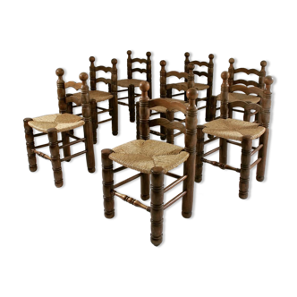 Wooden chairs and mulched seats, France, 1950