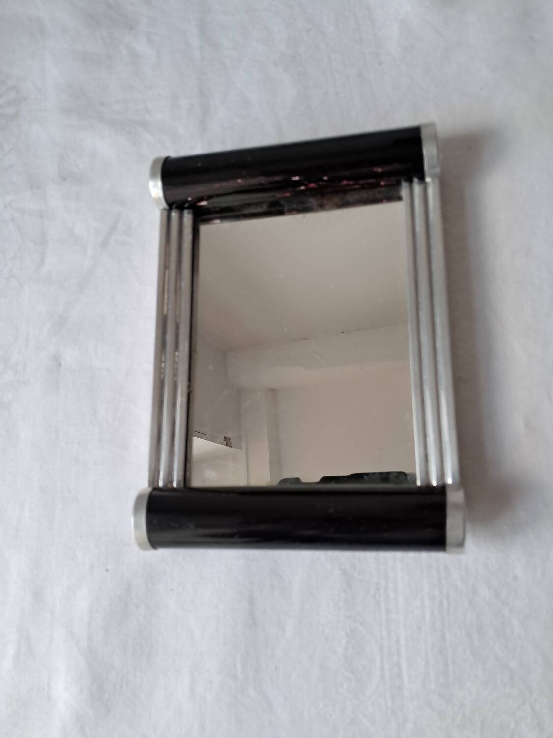 Biscuit tin on its mirrored tray, 1920