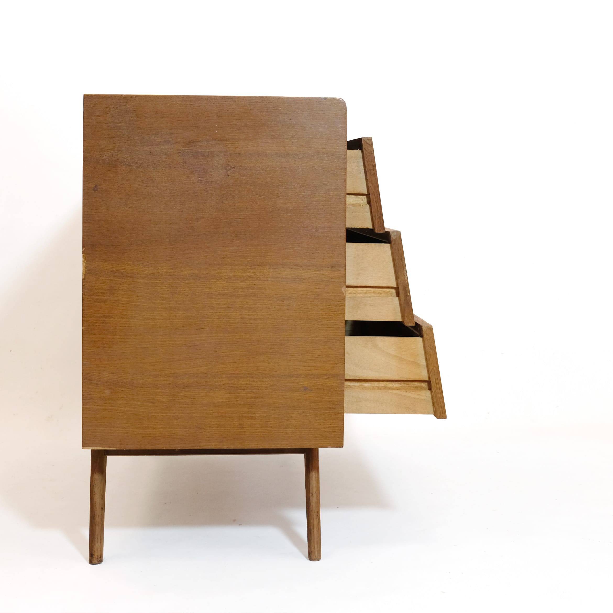 Wooden and rattan chest of drawers from the 60s.