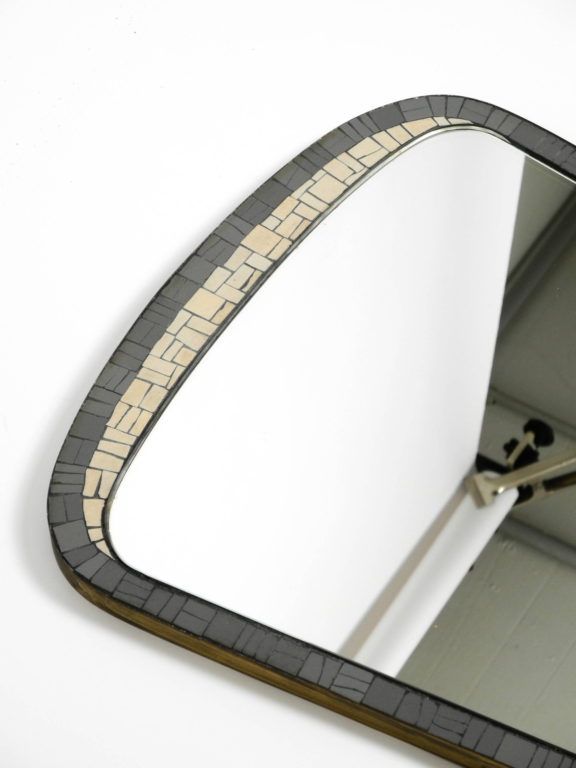 Mid Century mosaic wall mirror with brass frame by Münchner Zierspiegel