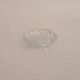 Round ashtray in chiseled glass