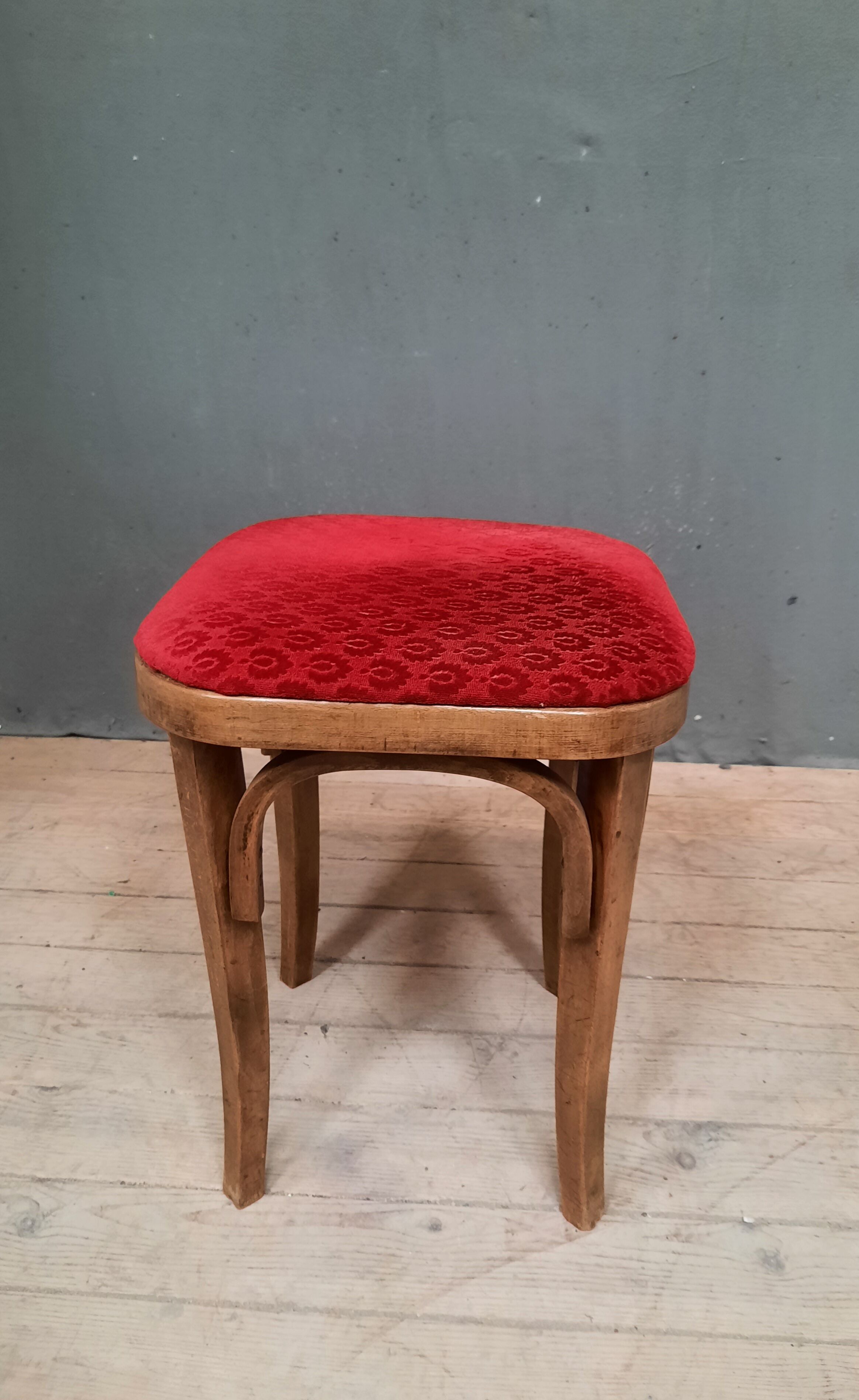 Curved wooden stool