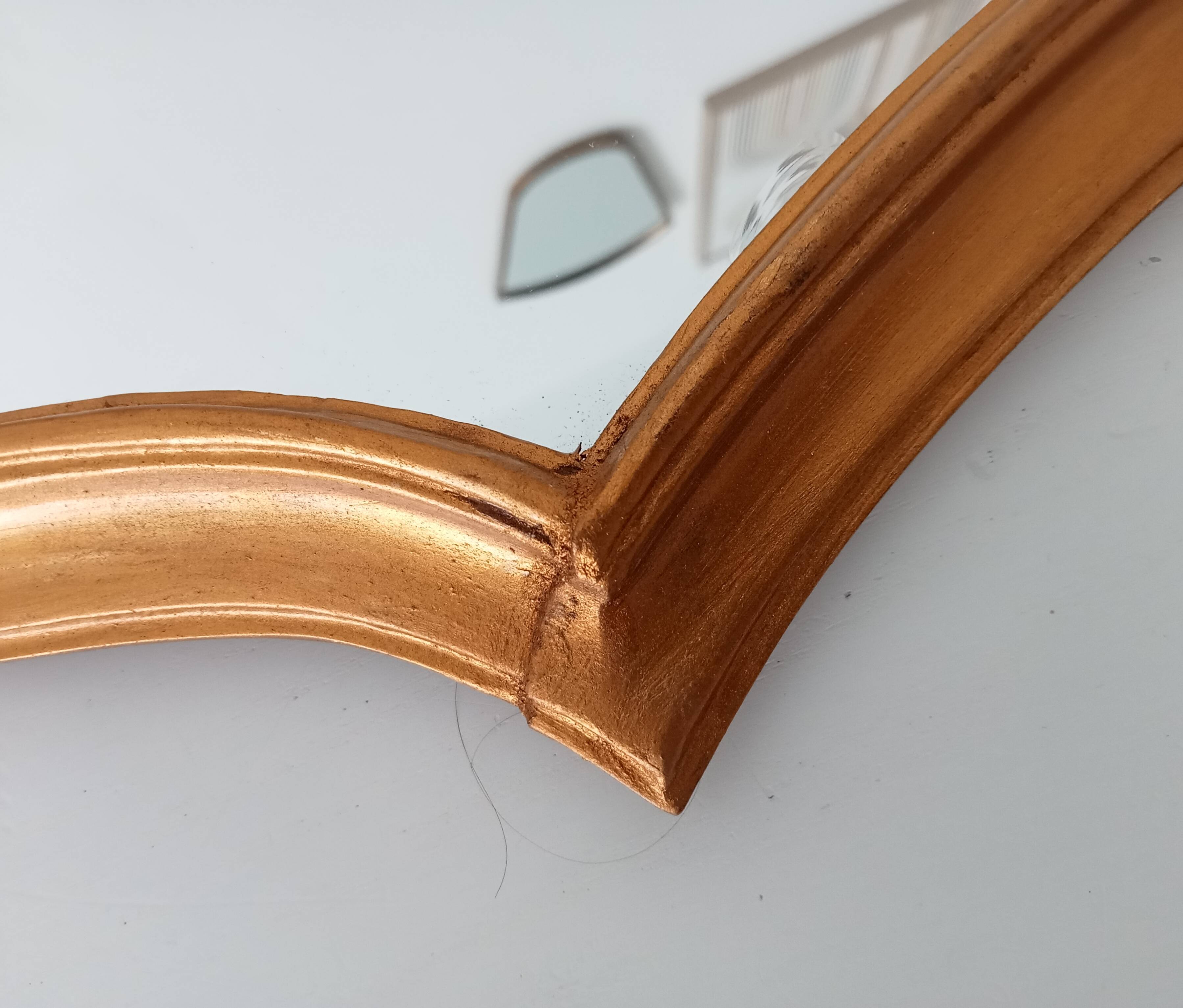 Vintage baroque mirror in gilded wood