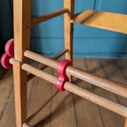 Doll high chair in wood – 1970s, foldable and on wheels