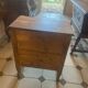 Small Provençal jump commode in light wood in Louis XV style.