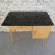 Baumann desk in light wood and black Formica, around 1960.