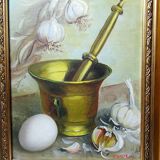 Still life with garlic, egg, and mortar signed Sarpe, 1979, oil on canvas.