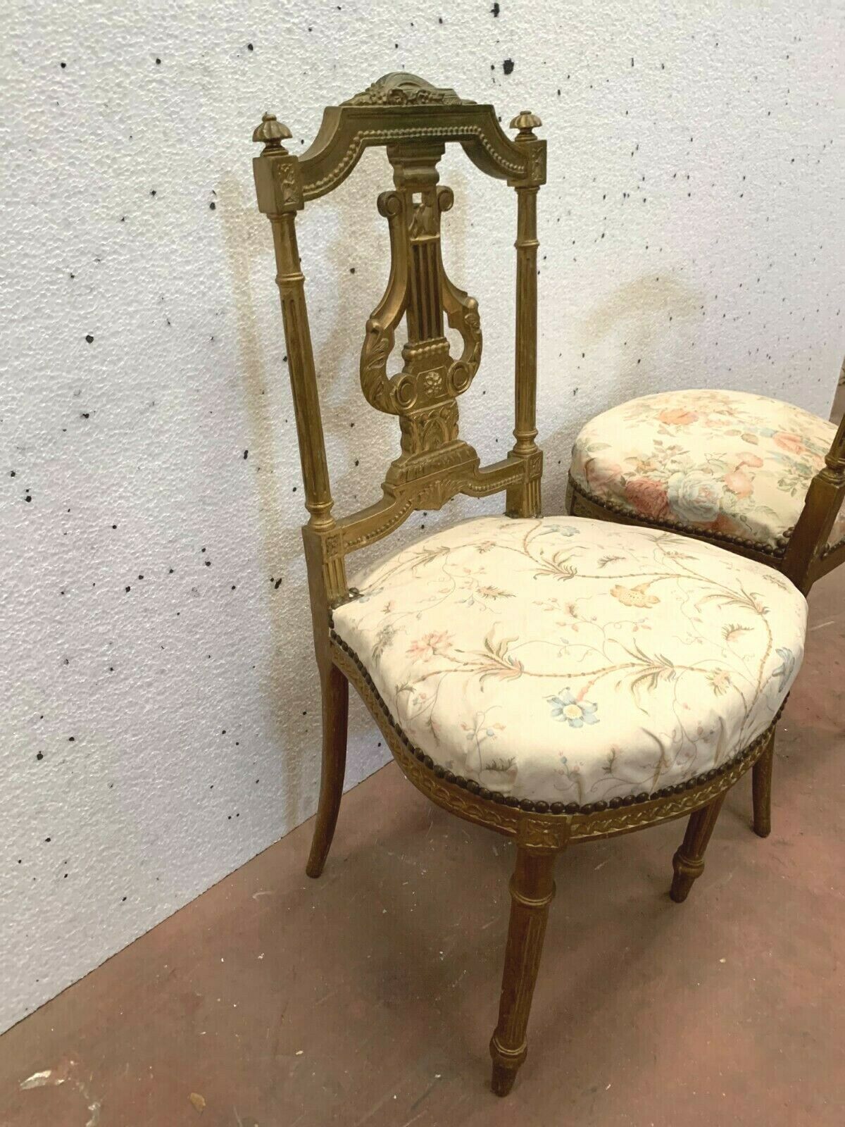 Pair of Louis XVI style chairs in 20th century gilded wood