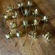 Set of brass candle holders x15