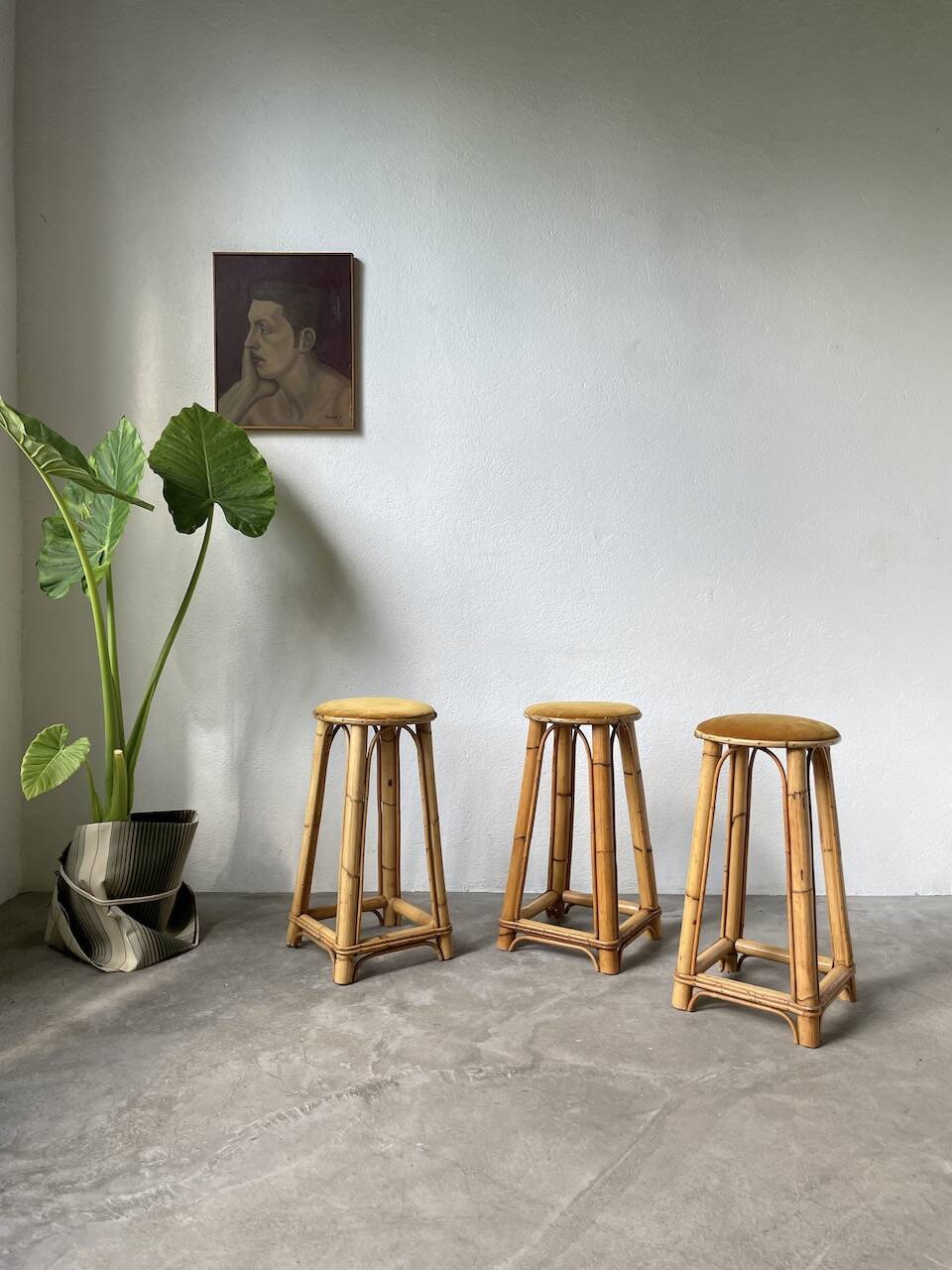 Set of three rattan high stools