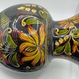 Black vase M/V floral patterns