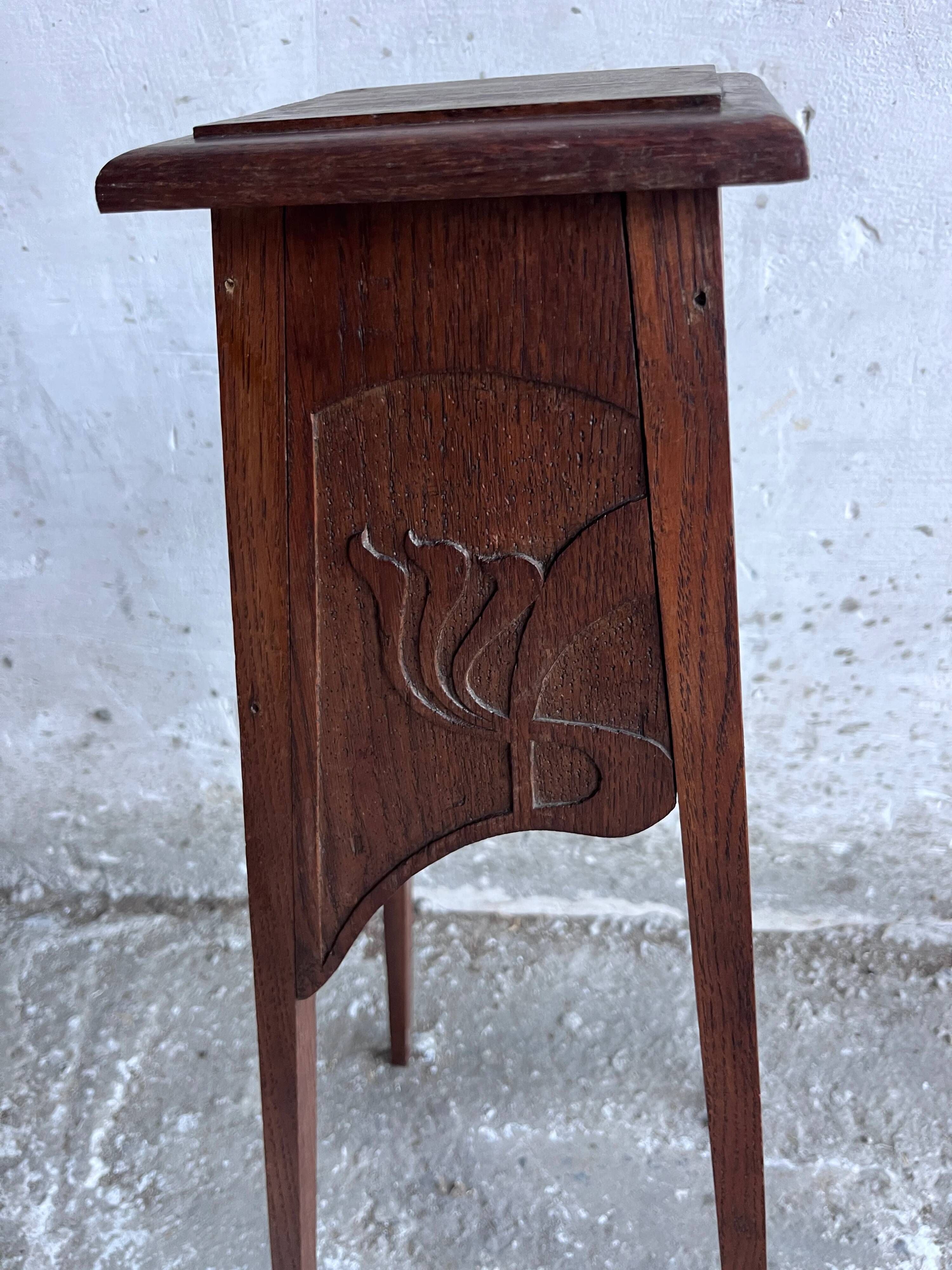 Sculpted wooden plant stand in Art Nouveau style, circa 1910.