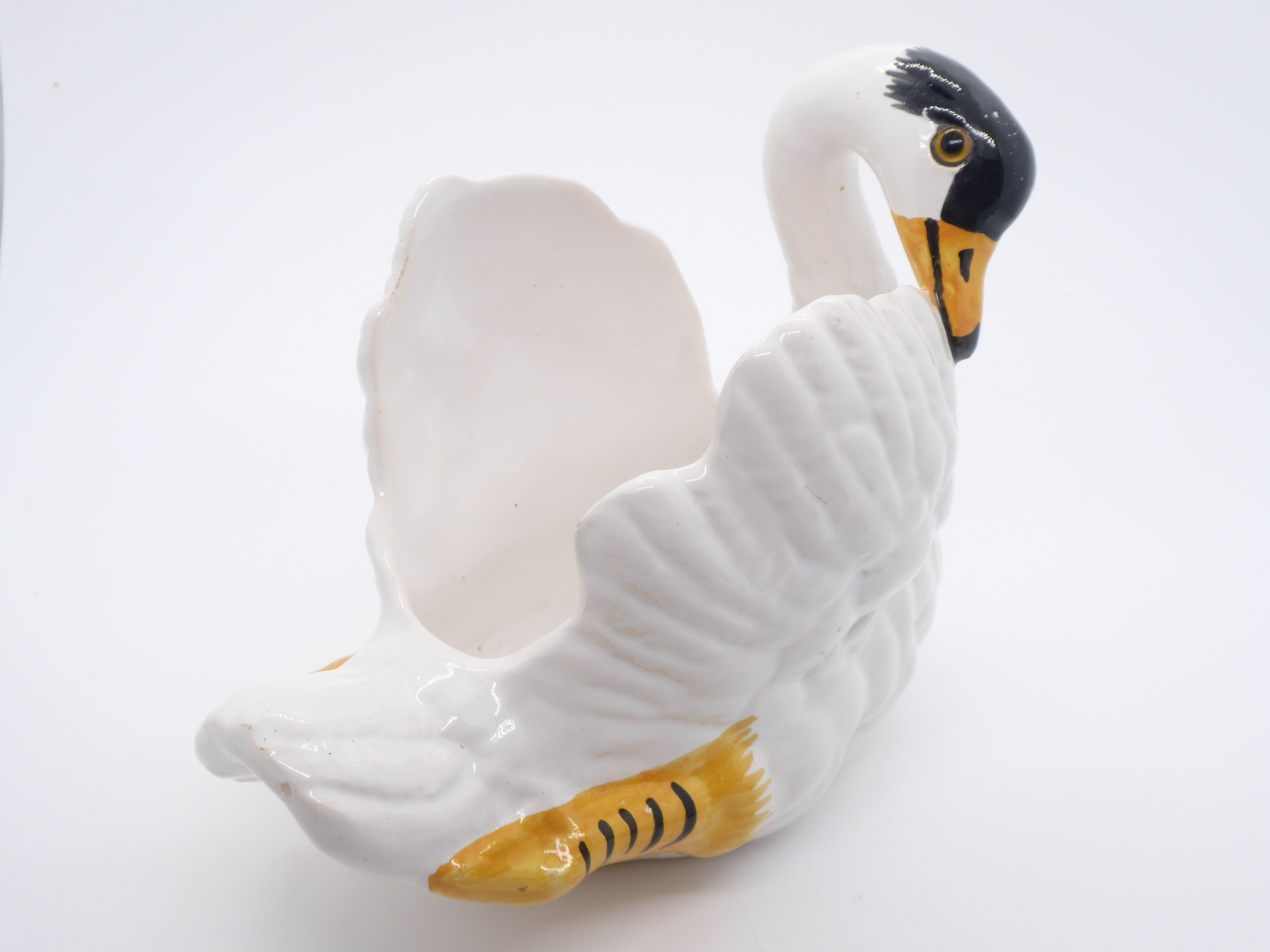 Ceramic pot cover in the shape of a swan