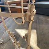 Old wrought iron cradle painted