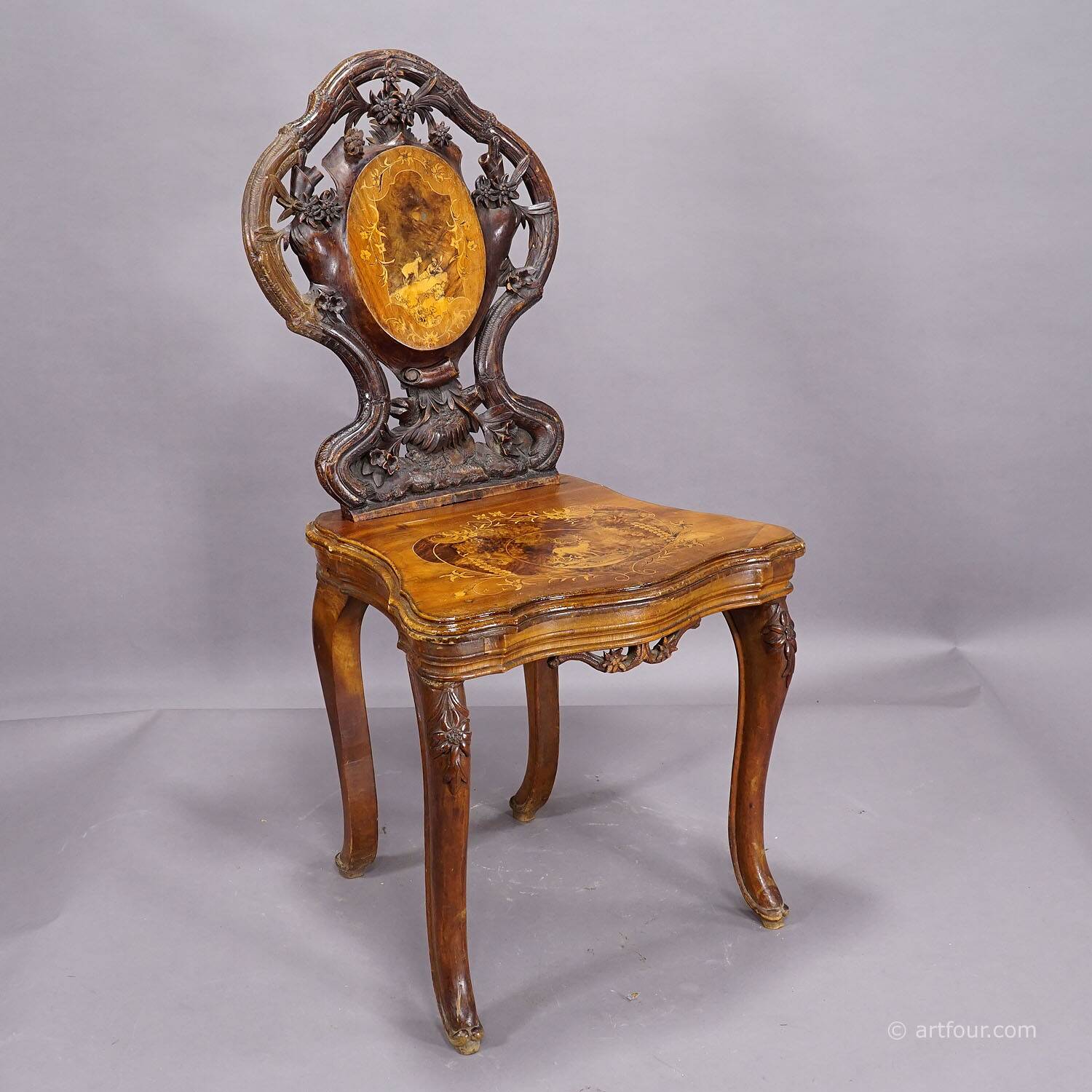 Pair of walnut chairs with Edelweiss marquetry, Brienz Switzerland 1900