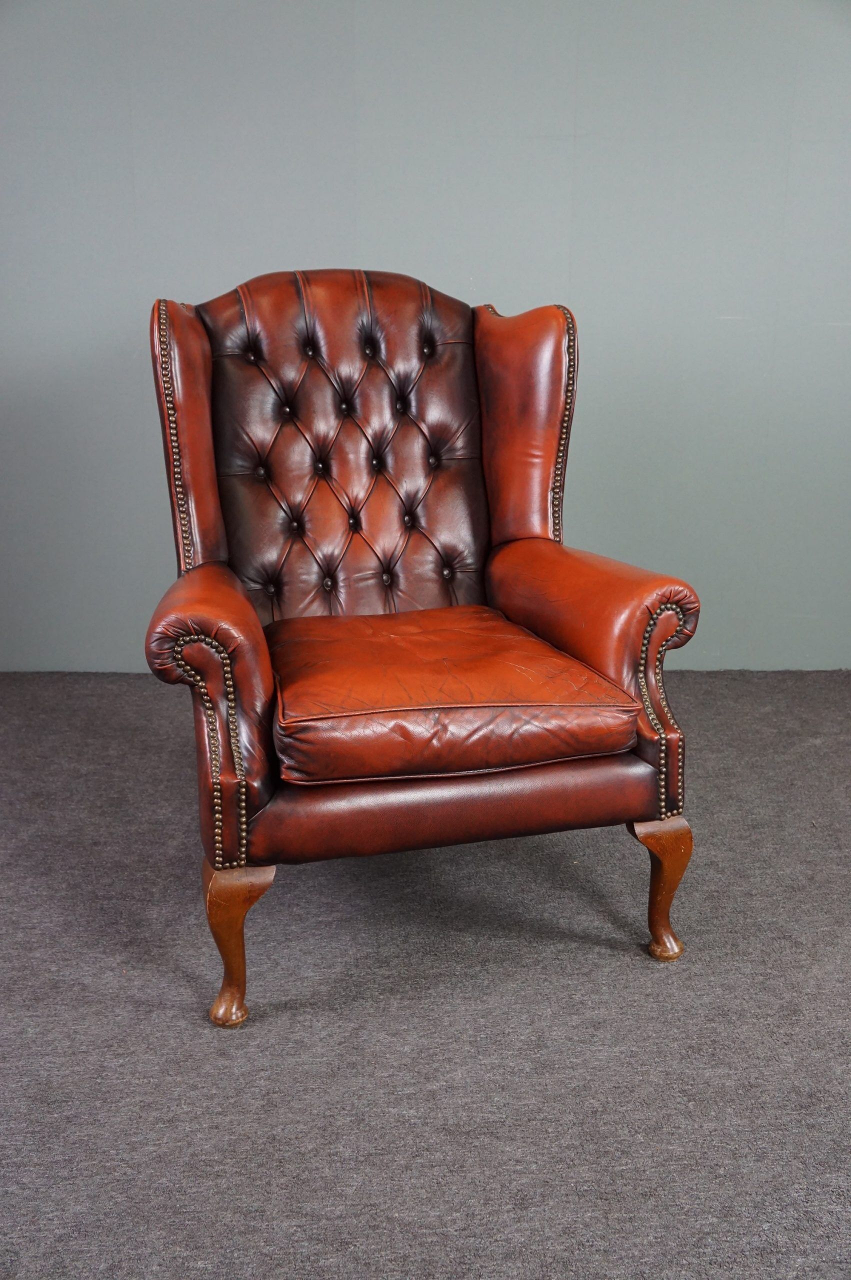 Fauteuil Chesterfield en cuir de vachette