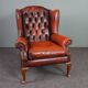 Fauteuil Chesterfield en cuir de vachette