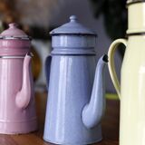 Set of old coffee makers in enamelled sheet metal