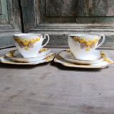 Set of two Caversham trios (cup, saucer and squared plate) , England, 1940s