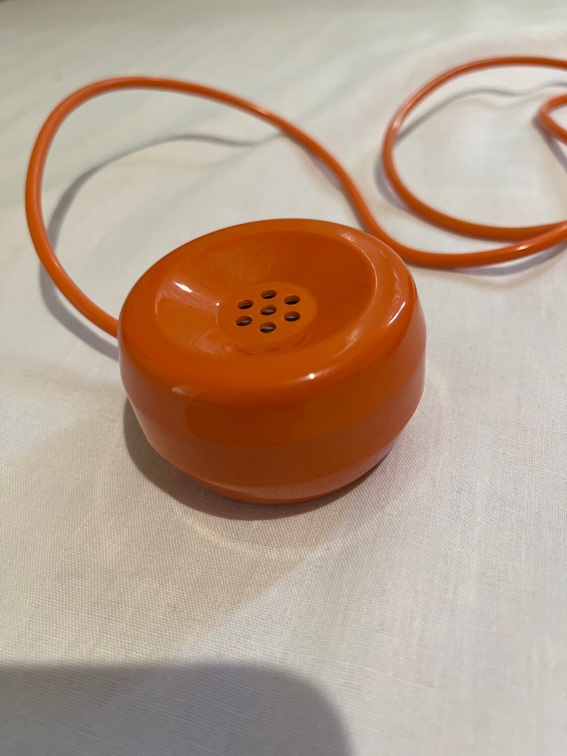 Orange vintage phone with socotel dial