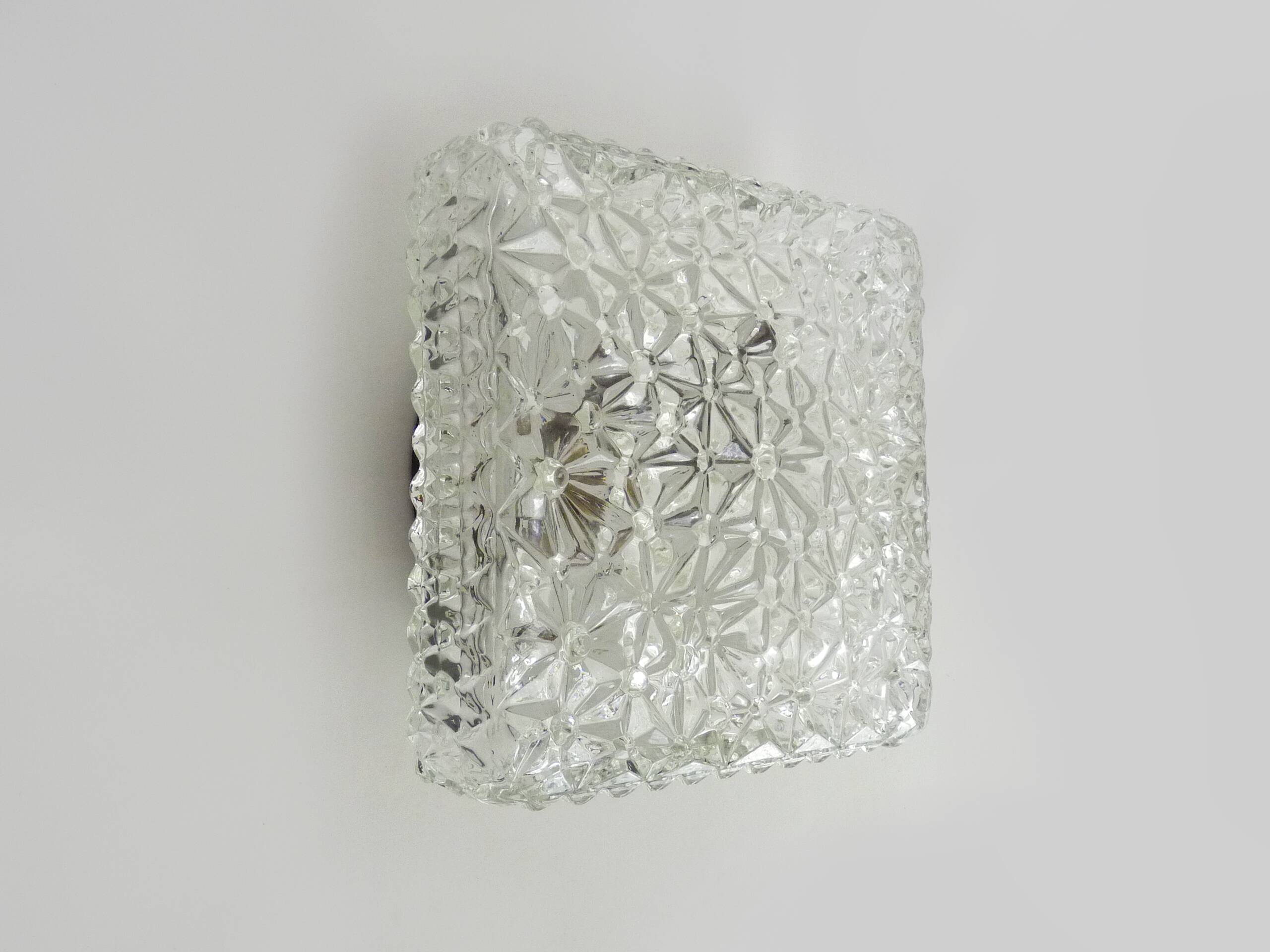 Wall lamp or ceiling light in glass and metal from the 50s and 60s.