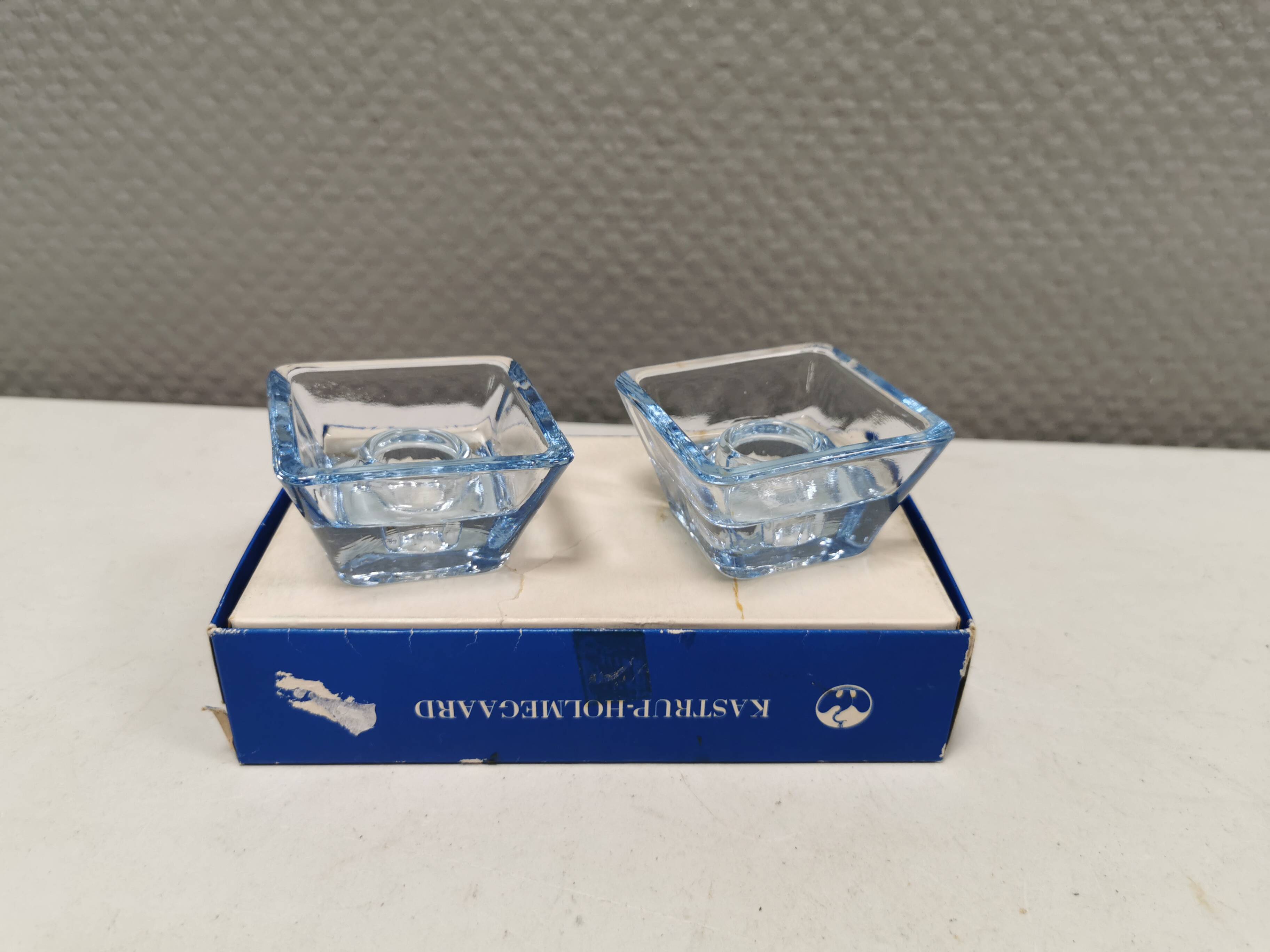 Two candleholders in turquoise/tranparent glass from Danish Kastrup-Holmegaard glassworks 1965-72