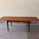 Extendable dining table in teak