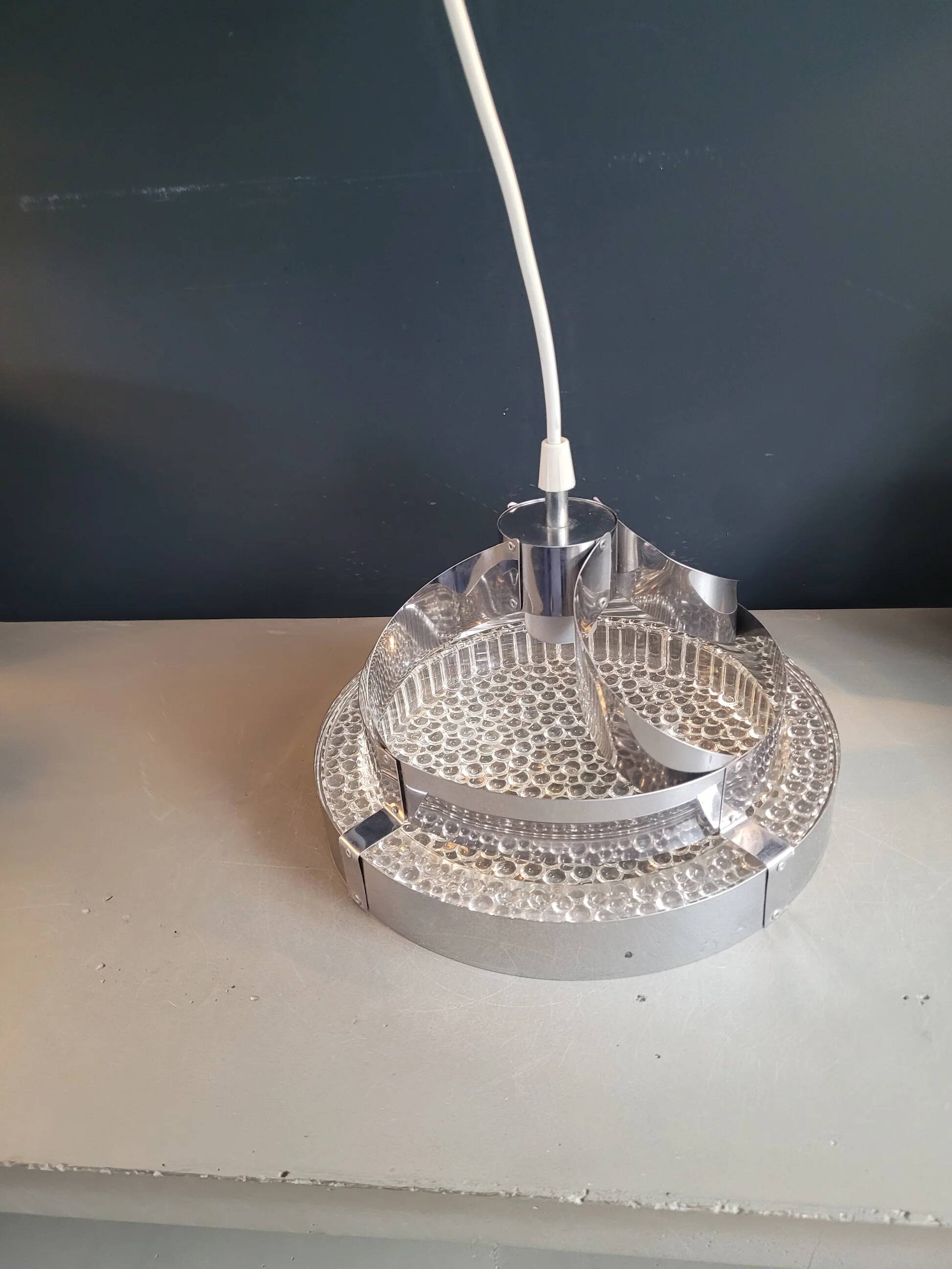 Suspension space-age in plastic bubble and aluminium