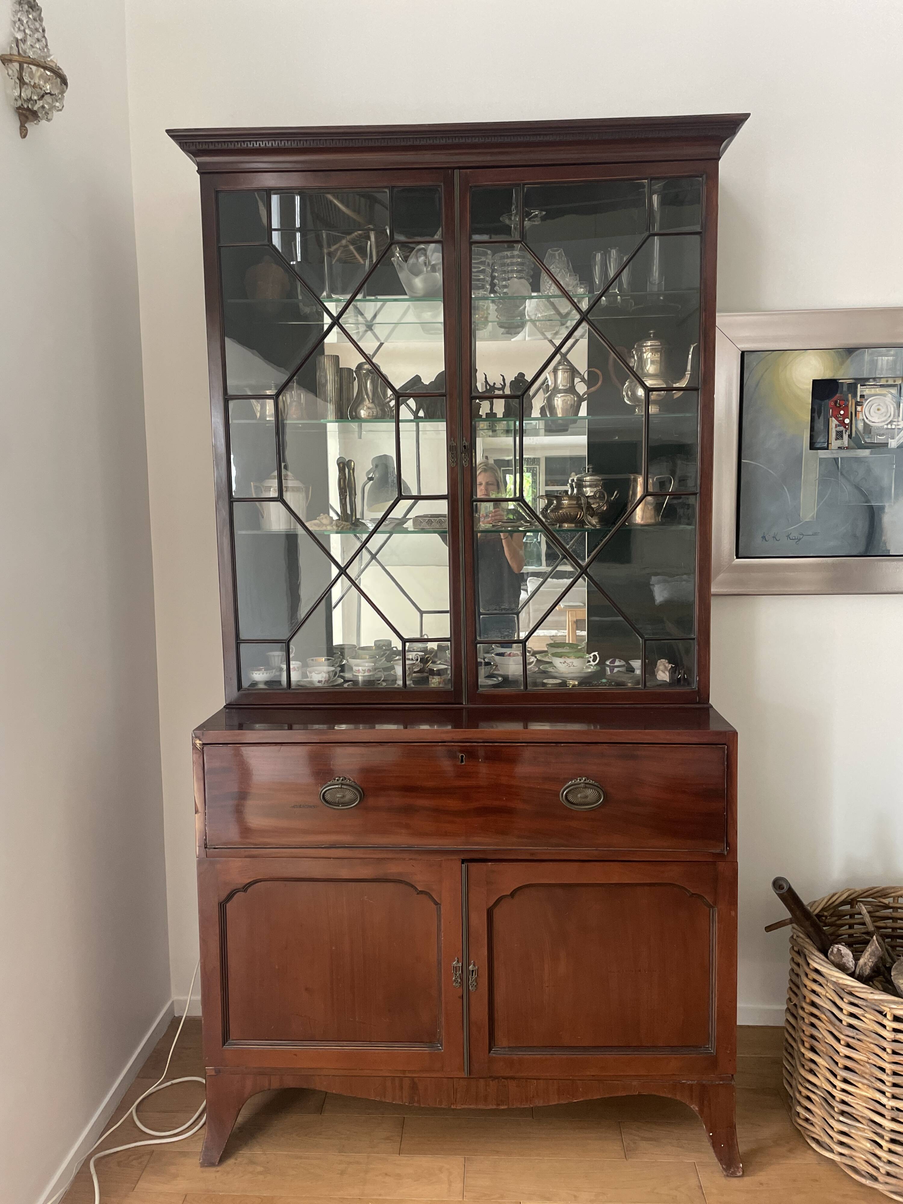Library with English mahogany secretary.