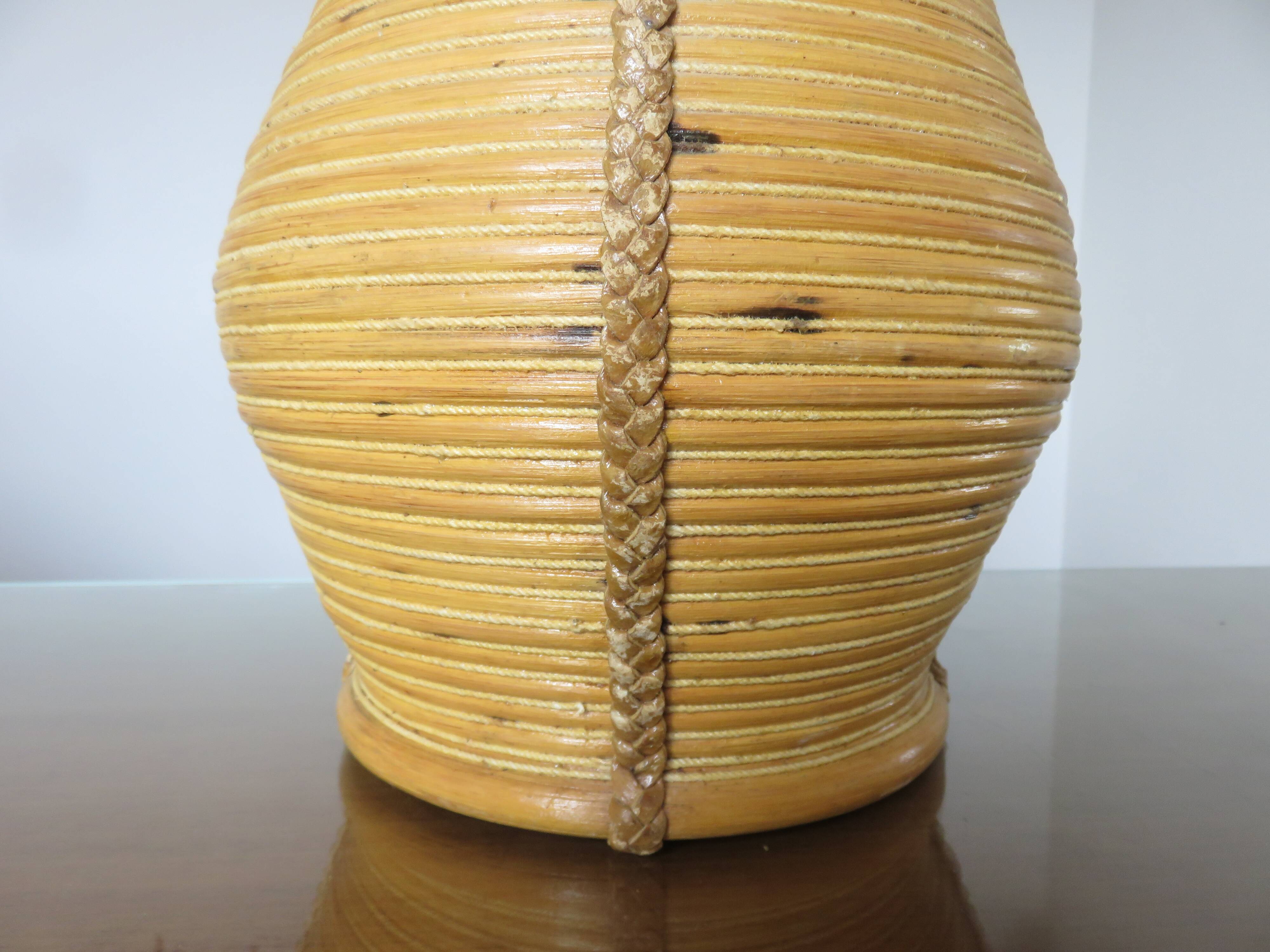 Rattan, leather, rope, and wood lamp in the style of Gabriella Crespi 60-70.