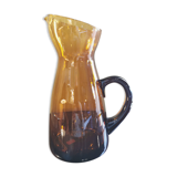 Vintage pitcher in amber glass
