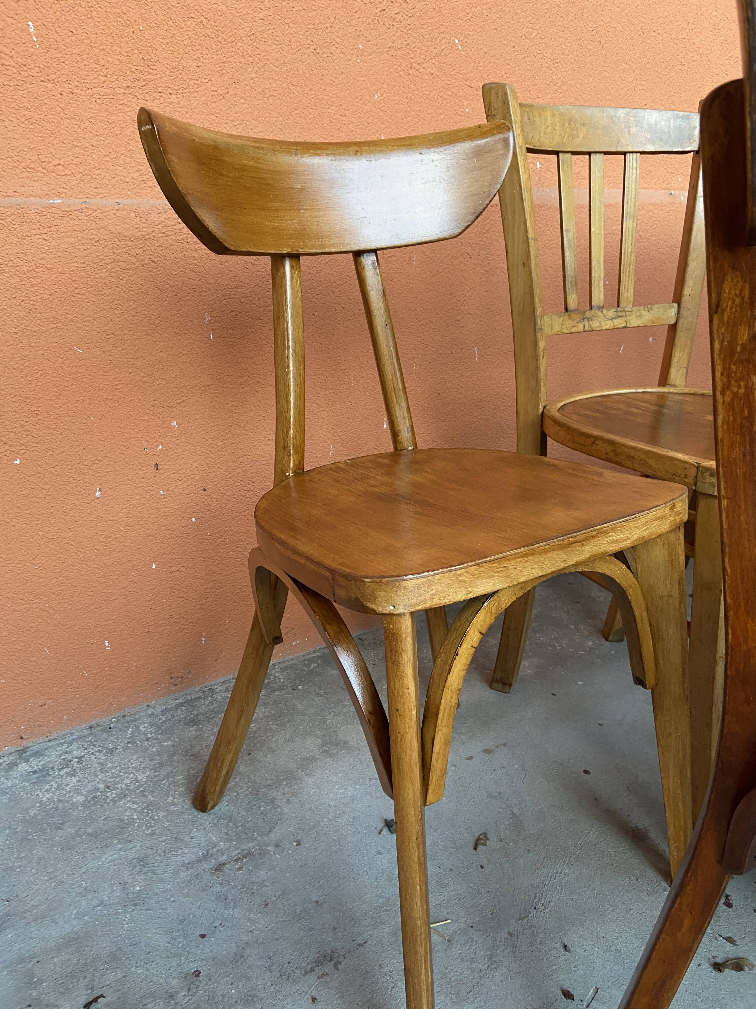 Set of 30 mismatched bistro chairs French Restaurant curved wood