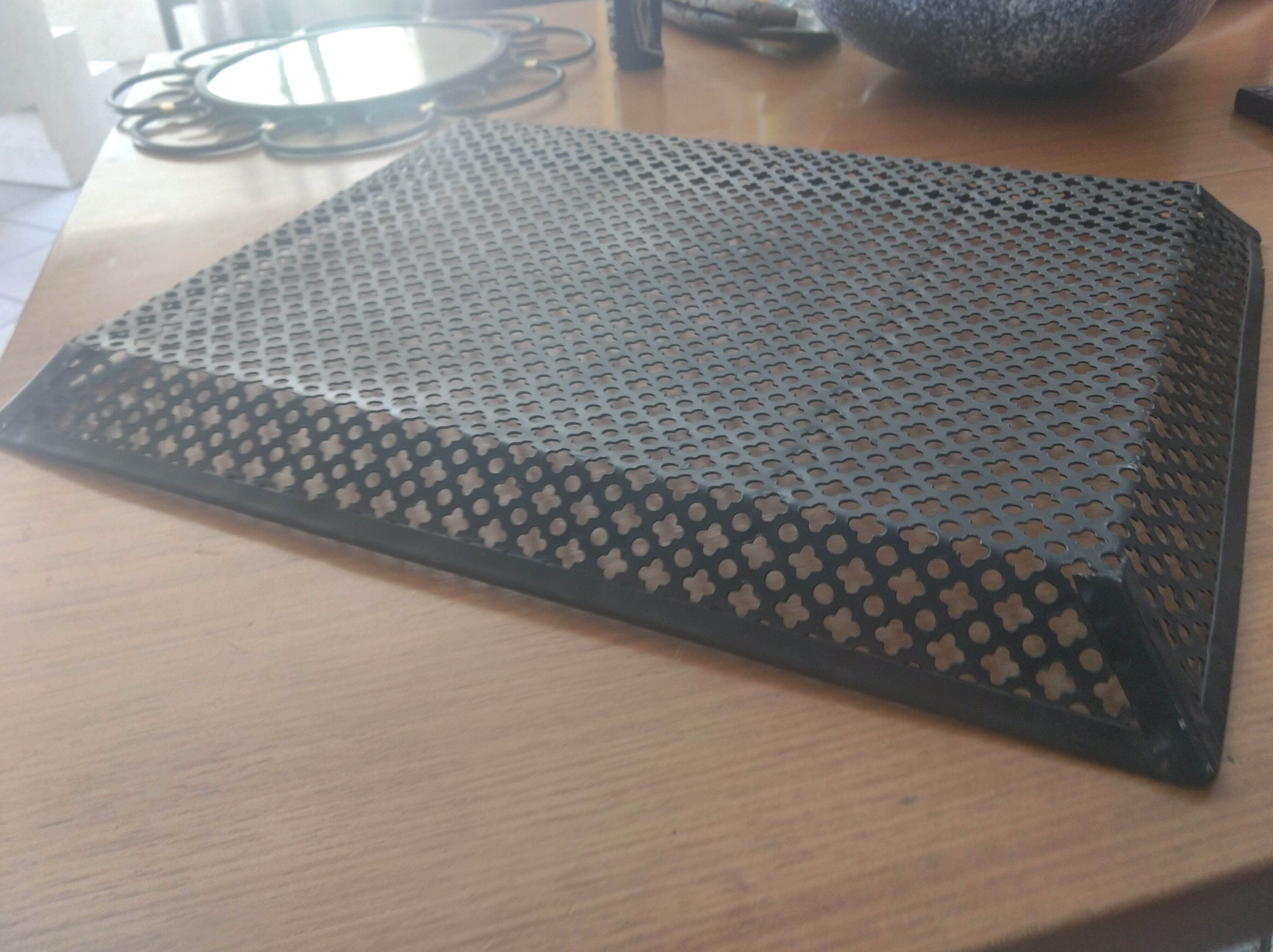 Perforated sheet metal tray, circa 1950