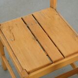 Set of six solid pine chairs by Maison Regain.