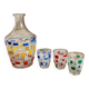 Vintage carafe and its 3 graphic style liqueur glasses.