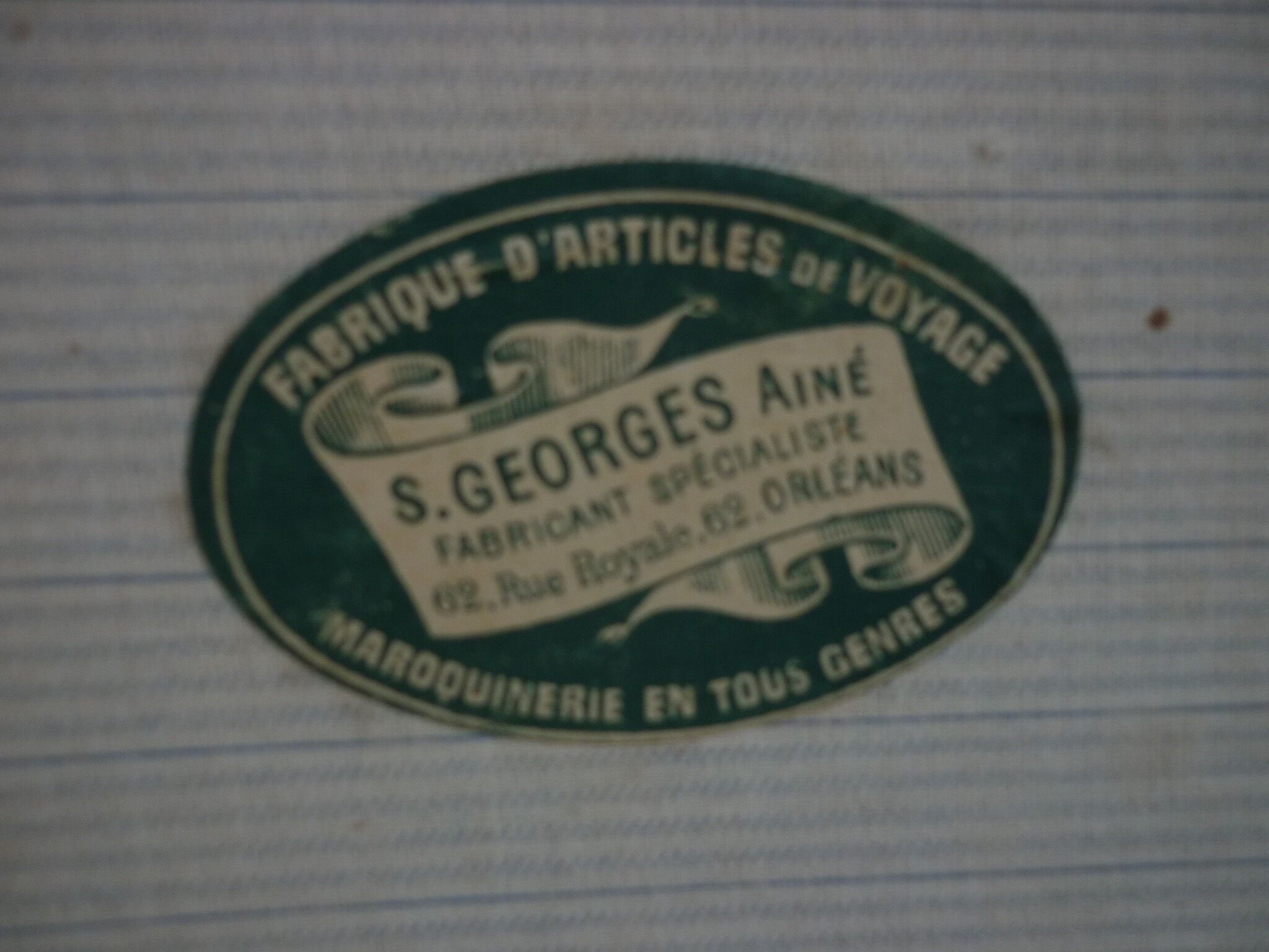 Green cardboard suitcase