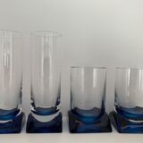 4 blue crystal glasses with rectangular base
