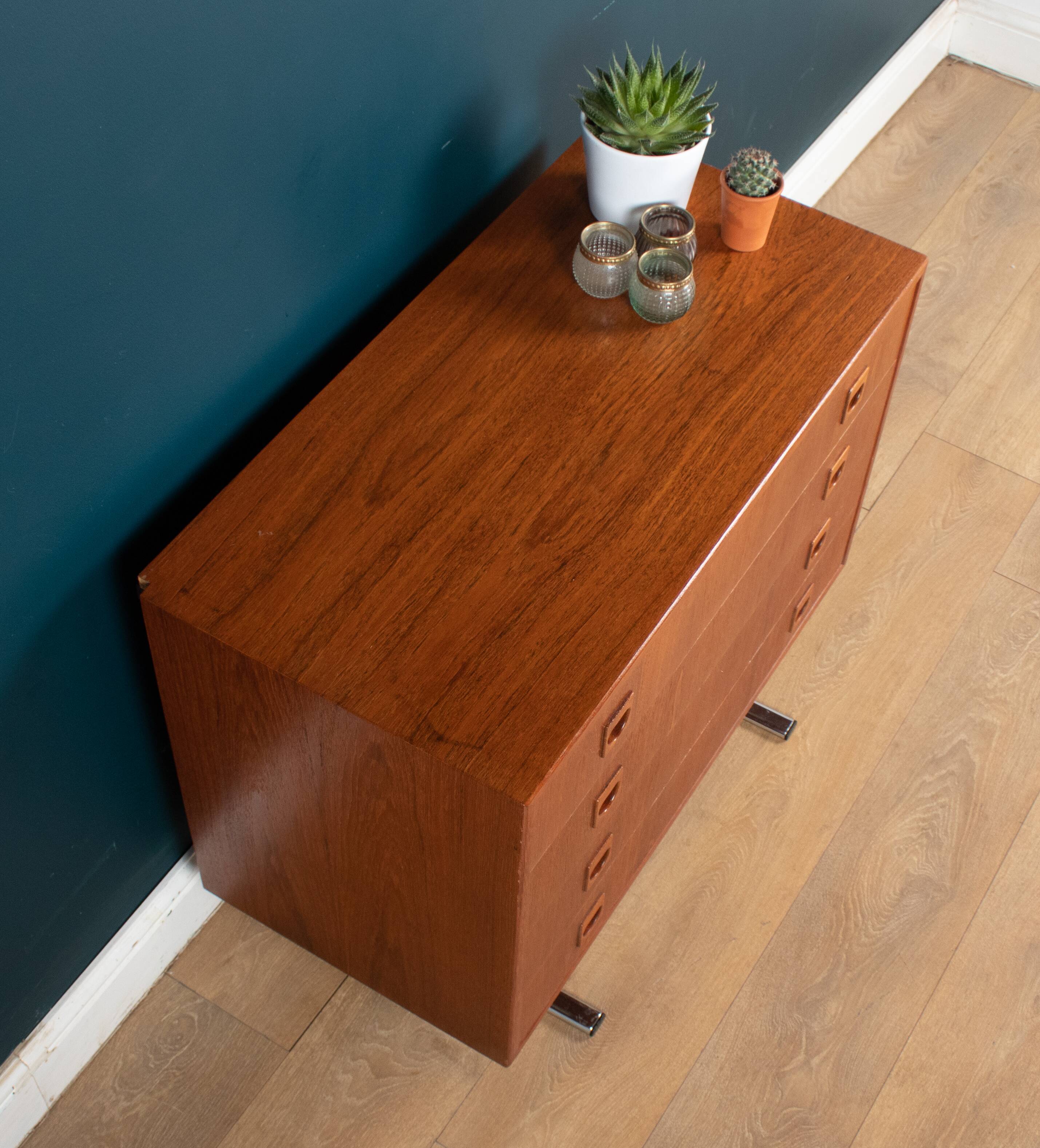 Retro teak 1960s danish chest of drawers on metal legs
