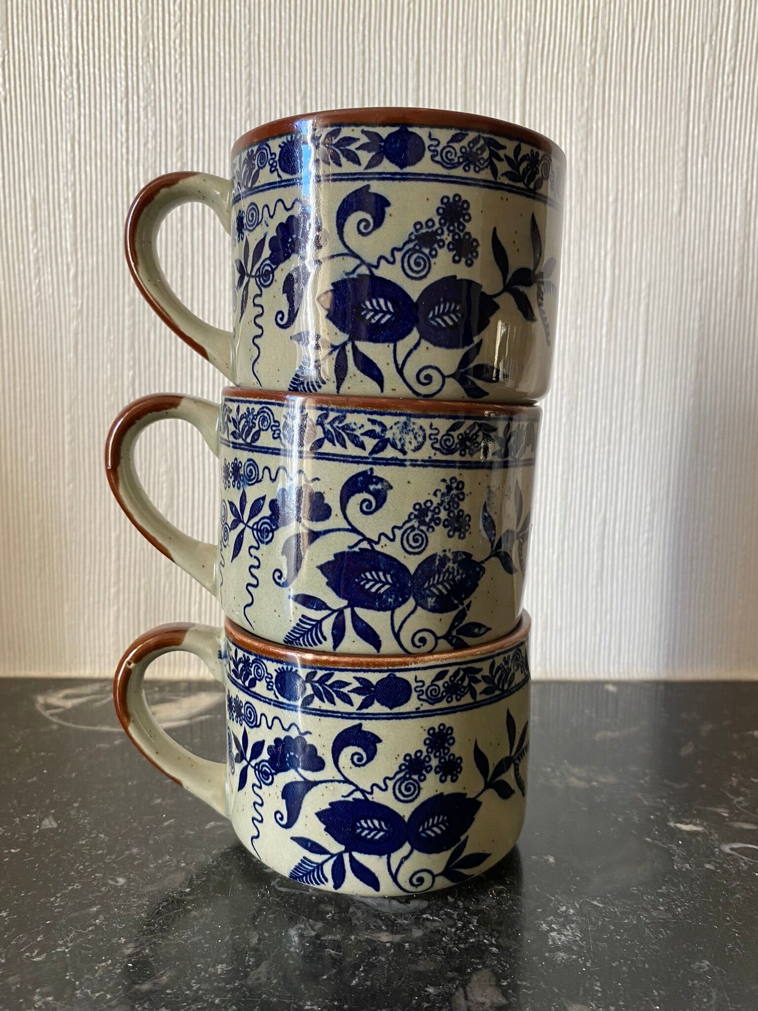 Trio of ceramic coffee cups