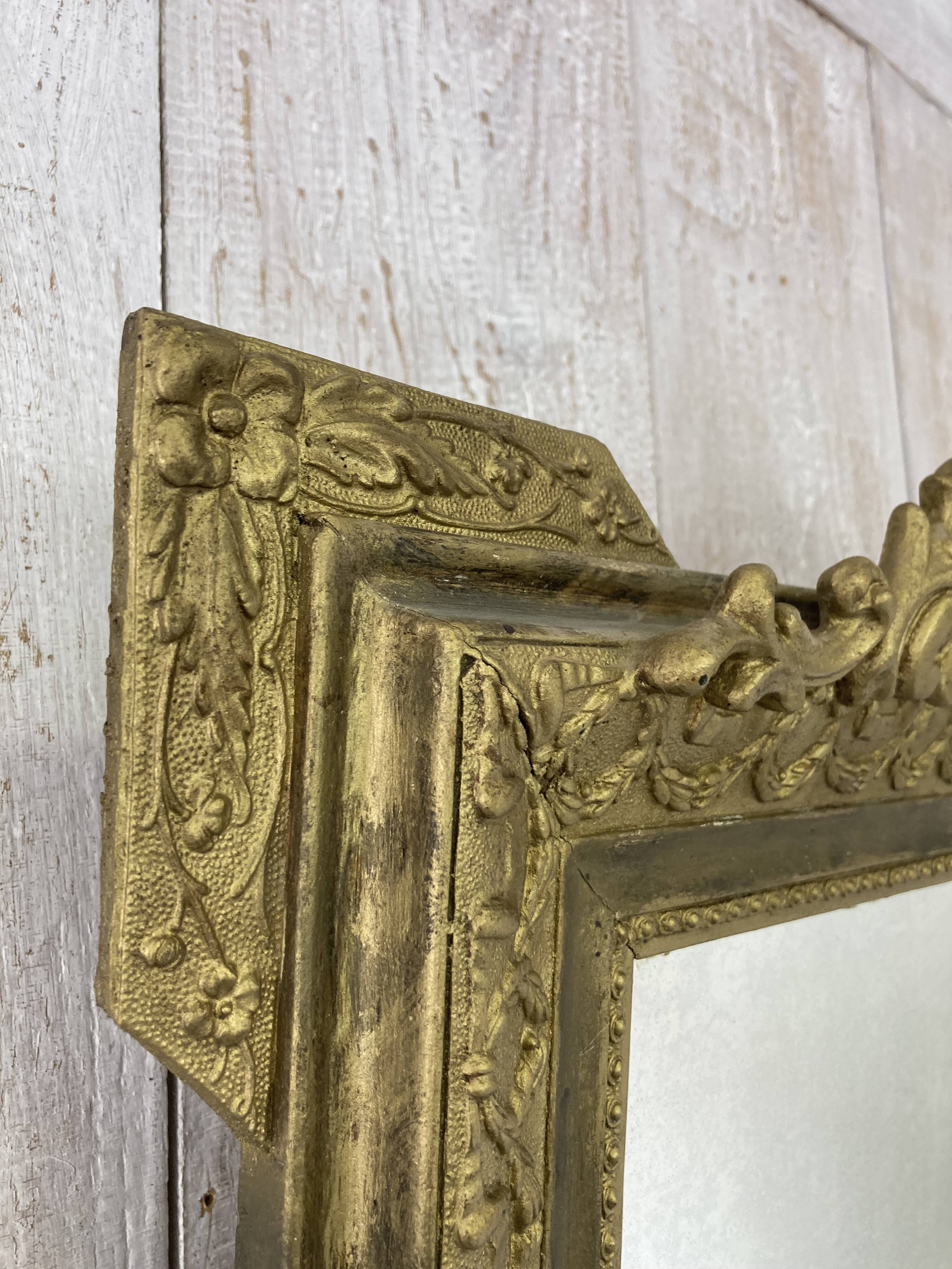 Antique mirror with a pediment