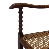 Fauteuil Art Déco en chêne tressé, design minimaliste.