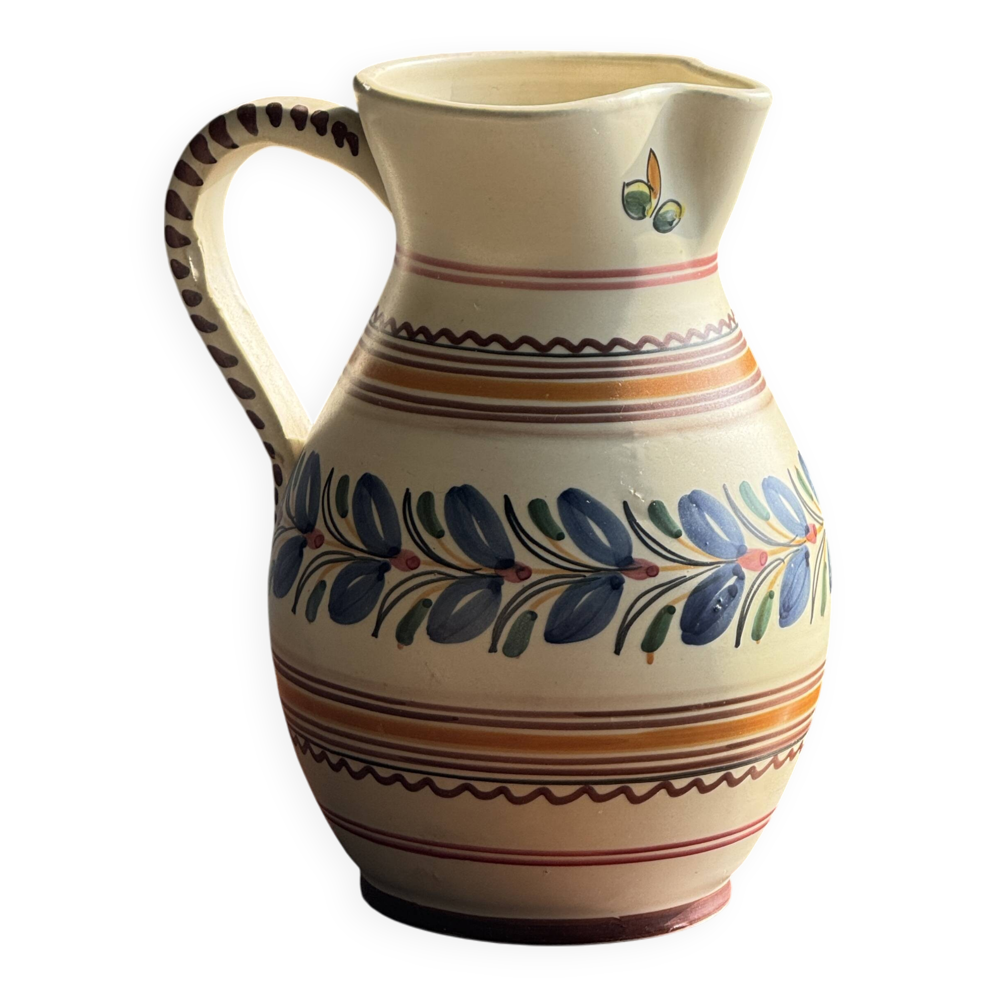 Beige carafe with stylized blue flower friezes