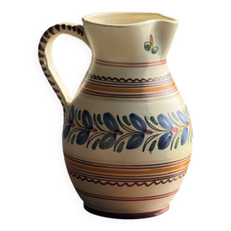 Beige carafe with stylized blue flower friezes